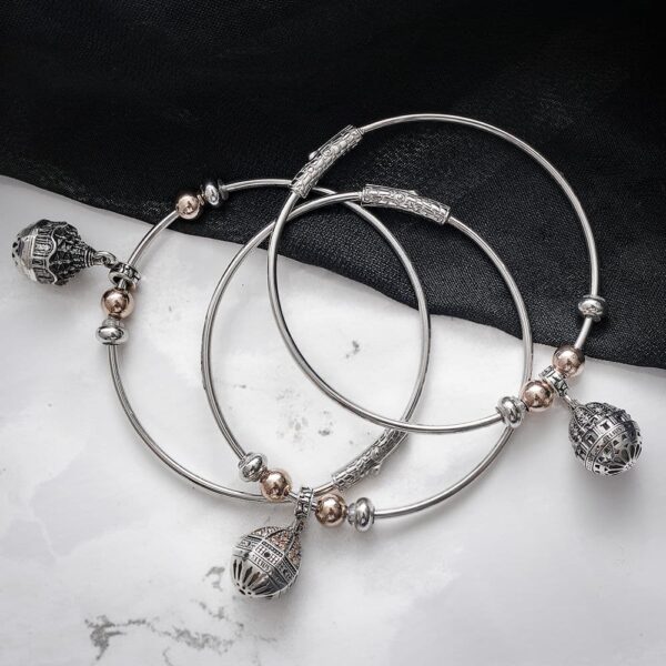 Rigid modular bracelet with silver Cupola charms